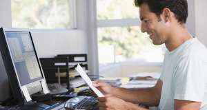 bigstock-Man-In-Home-Office-Using-Compu-4133309-900x480